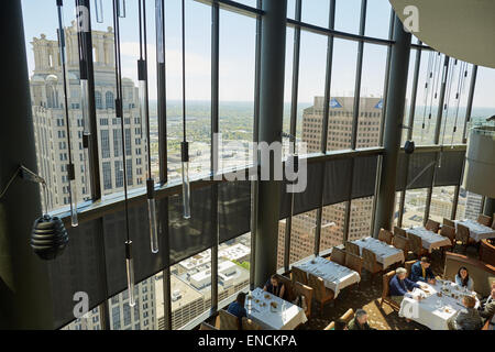 `Downtown Atlanta in Georga USA One Ninety One Peachtree Tower is a 235 m (771 ft) 50-story skyscraper seen through the windows Stock Photo